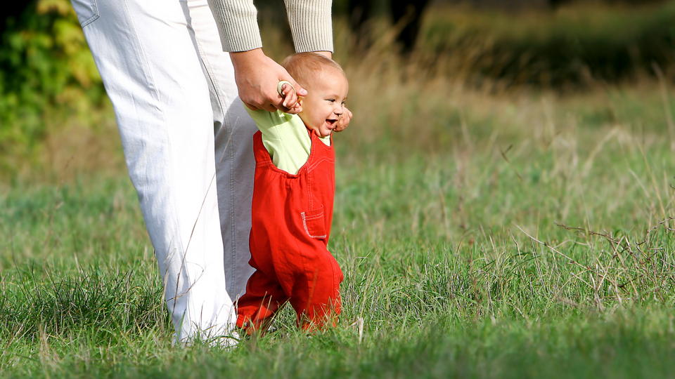 infant learning to walk