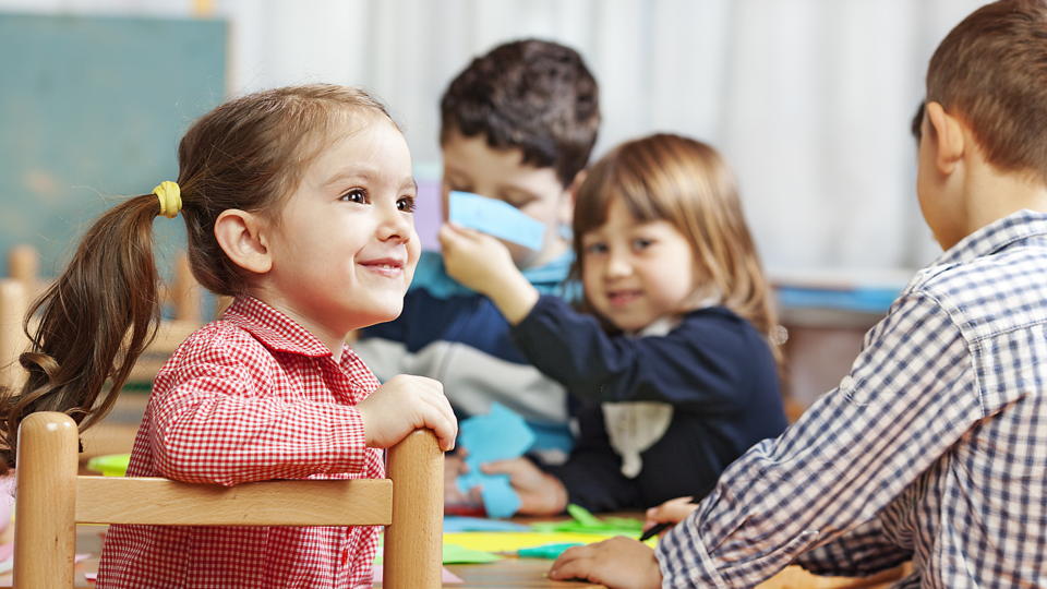 kindergarten students talking to each other