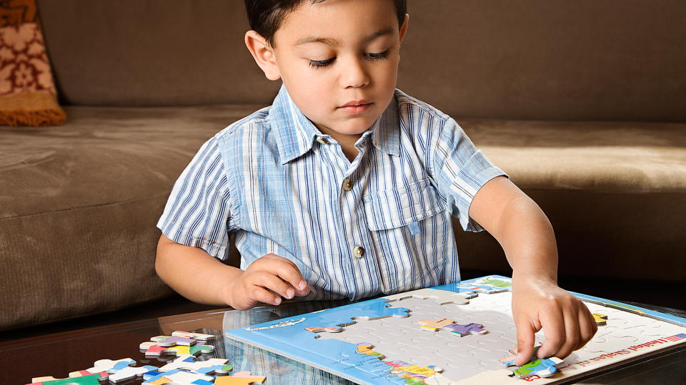 Preschooler with Puzzle