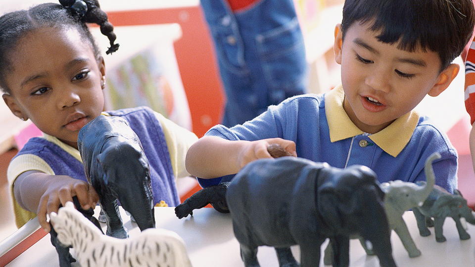 Animals playing store with toys